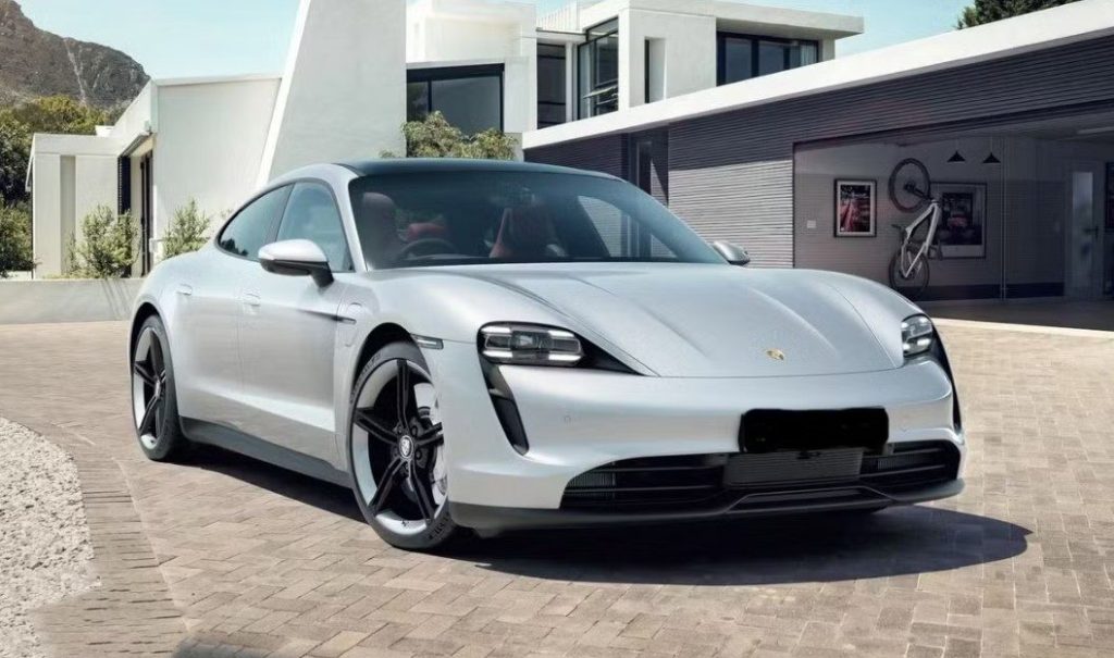 Silver 2021 Porsche Taycan Turbo, front three-quarter view, available for hire in Sydney