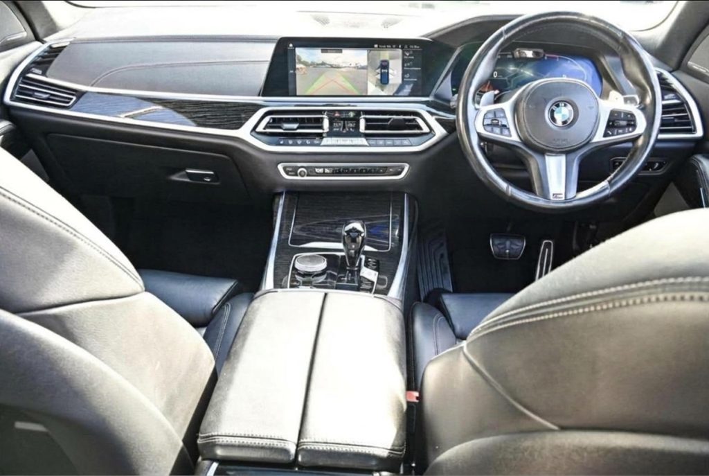 Dashboard of the blue 2019 BMW X7 xDrive30d, available for hire in Sydney