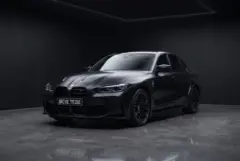 BMW M3 Competition Matte Black, studio, front three quarter
