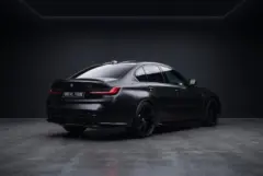 BMW M3 Competition Matte Black, studio, rear three quarter