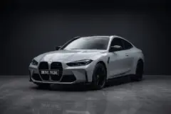 BMW M4 Competition Nardo Grey, studio, front three quarter