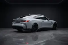 BMW M4 Competition Nardo Grey, studio, rear three quarter